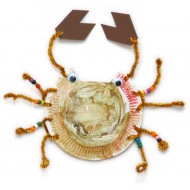 Use a color painted paper dish and add some parts to compose a crab